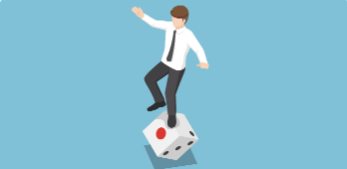Man juggling his footing on dice
